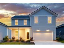 Charming two-story home featuring a well-maintained lawn and a spacious two-car garage at 213 West Bradford Pointe Dr, Summerville, SC 29486