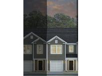 Charming two-story townhomes offer modern design, attached garages and well-lit exteriors at 139 Yarrow Way, Moncks Corner, SC 29461