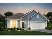 Charming single-story home featuring blue siding, a well-manicured lawn, and an attached garage at 158 Royal Cainhoy Way, Huger, SC 29450