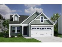Charming single Gathering home displaying a well maintained lawn and a two car garage at Tbd O'Leary Circle, Summerville, SC 29483