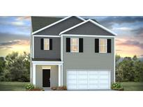Two story home with a two car garage, grey siding, dark shutters, and a landscaped front yard at 2324 Macallan Blvd, Ravenel, SC 29470