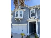 Charming two-story home with a one-car garage, bay window, and stylish entrance at 2338 Kings Gate Ln, Mount Pleasant, SC 29466