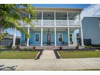Charming two-story home with a welcoming front porch and well-maintained landscaping at 310 Ripple Park Dr, Summerville, SC 29486