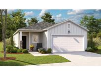 Charming single-story home with a two-car garage, well-manicured lawn, and inviting curb appeal at 319 Tiliwa Street, Summerville, SC 29486