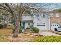 Charming two-story home with a well-manicured lawn and attached garage at 29 Meander Row, Charleston, SC 29412