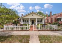 Charming home featuring a picket fence and inviting front porch at 798 Rutledge Ave, Charleston, SC 29403