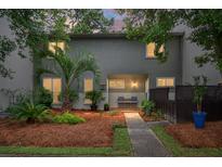 Charming two-story home features a well-maintained landscaped yard with a pathway to the front door at 1603 Ventura Pl, Mount Pleasant, SC 29464
