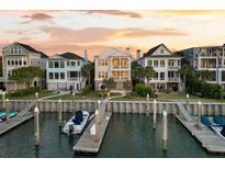Beautiful waterfront homes with private docks and stunning sunset views at 21 Morgan Place Dr, Isle of Palms, SC 29451