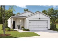 Charming single story home with white siding, a two-car garage, and a cozy front porch at 327 Pine Crest View Dr, Summerville, SC 29486