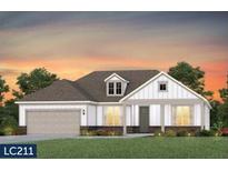 Charming single-Gathering home featuring a two-car garage, dormer window, and lovely landscaping at 747 Spring Highlands Dr, Summerville, SC 29486