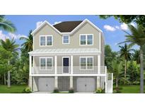 Two-story beach home with double garage, covered porch and charming facade at 1423 Dahlia Dr, Mount Pleasant, SC 29464
