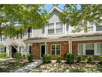 Charming townhouse with brick facade and well-maintained landscaping at 104 Buchanan Cir, Goose Creek, SC 29445
