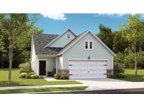 Charming single-Gathering home featuring a two-car garage, stone accents, and lush landscaping at 1017 Sagegrass St, Summerville, SC 29485