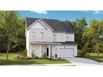 Charming two-story home with a covered front porch and well-manicured lawn at 540 Richfield Way, Summerville, SC 29486