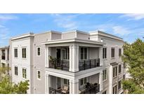 Beautiful condominium with open air balconies and black metal railings, offering amazing outdoor living at 200 River Landing Dr # D310, Charleston, SC 29492