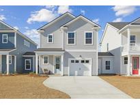 Charming two-story home with gray siding, a white garage door, and well-manicured front yard at 488 Queenview Ln, Charleston, SC 29414