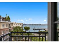 Enjoy scenic water views from this condo's private balcony overlooking the harbor and historic downtown at 5 Gadsdenboro St # 503, Charleston, SC 29401