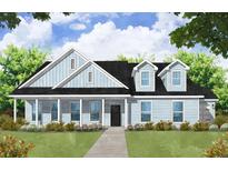 Charming single-story home with a welcoming front porch and classic architectural details at 1964 Central Ave, Summerville, SC 29483