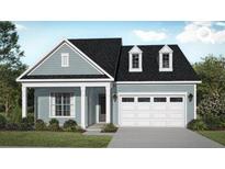 Charming one-story home with blue siding, black roof, white trim, a covered entry, and an attached two-car garage at 428 Evening Glow Ln, Summerville, SC 29486
