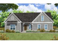 Charming single-story home with gray siding, gabled roof, and well-manicured lawn at 1960 Central Ave, Summerville, SC 29483
