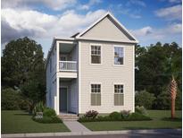 Charming two-story home with a small balcony, landscaped yard, and classic architectural details at 236 Clearpath Dr, Summerville, SC 29486