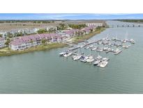 Stunning waterfront condos with private boat slips and access to beautiful waterways at 74 Mariners Cay Dr, Folly Beach, SC 29439
