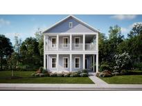 Charming two-story home featuring a double porch and manicured lawn at 122 Moscato Ln, Summerville, SC 29485