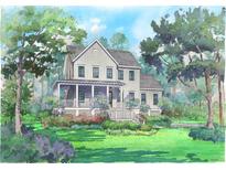 Charming two-story home with a welcoming front porch and beautifully landscaped yard at 1449 Jeremy Cay Ct, Awendaw, SC 29429
