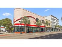 Unique building on city street with red accent and trees for character at 517 King St # 13, Charleston, SC 29403