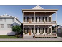 Charming two-story home with a double porch, perfect for enjoying the outdoors at 63 Montagu St, Charleston, SC 29401