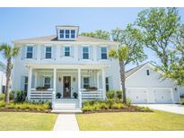 Charming two-story home with light blue shutters, inviting front porch, and well-manicured lawn at 3688 Goodwater St, Mount Pleasant, SC 29466