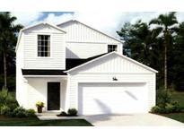 Charming two-story home featuring white siding, a front-facing garage, and a well-manicured lawn at 511 Kitsap Ct, Summerville, SC 29486