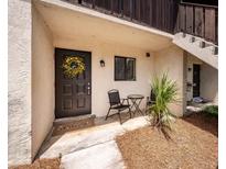 Inviting front entryway featuring outdoor seating, a decorative wreath, and a welcome mat at 2901 Dove Haven Ct # C, Charleston, SC 29414