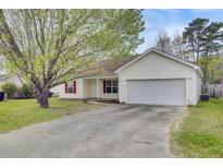 Charming single-story home with attached garage and well-maintained front yard and driveway at 109 Wisteria Ct, Summerville, SC 29486