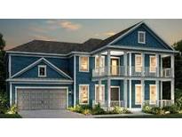 Charming two-story blue home featuring a double porch, attached garage, and well-maintained landscaping at 4272 Hugh Bennett Dr, Johns Island, SC 29455