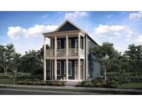 Charming two-story home with a covered porch, beautiful landscaping, and a classic exterior design at 708 Rumbling Leaf Ln, Summerville, SC 29486