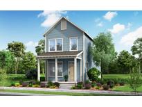 Charming two-story home featuring lap siding, a covered porch, and a neatly landscaped front yard at 814 Gentle Breeze Dr, Summerville, SC 29486