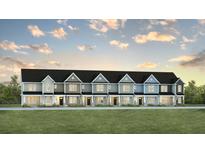 Charming townhome exteriors offer a variety of color palettes under a single roof and blue skies at 555 Gahagan Rd, Summerville, SC 29486