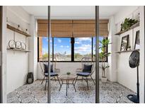 Relaxing balcony featuring stylish seating and a beautiful view at 14 Lockwood Dr # 1C, Charleston, SC 29401