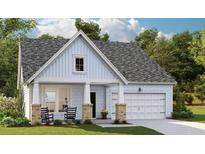 Charming single-story home with a welcoming front porch and manicured lawn at 332 Pine Crest View Dr, Summerville, SC 29486