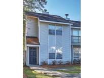 Charming townhouse featuring a classic exterior with a private entrance and ample natural light at 4652 Nibbs Ln, North Charleston, SC 29418