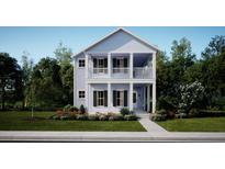 Charming two-story home featuring a double porch, light blue siding, black shutters, and lush landscaping at 786 Clay Field Trl, Summerville, SC 29485