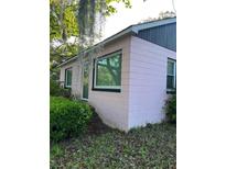 Charming single-story home with a corner facade, showcasing its quaint architecture and inviting appeal at 2066 Maybank Hwy, James Island, SC 29412