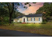 Charming single-story home with a well-maintained lawn and classic curb appeal at 2128 Golfview Dr, Charleston, SC 29412