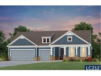 Charming single-story home with a welcoming front porch and a spacious two-car garage at 545 Pink Lily Ln, Summerville, SC 29486