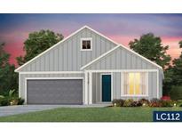 Charming single-Gathering home with a two-car garage and manicured front lawn at 628 Coral Bells Ln, Summerville, SC 29486
