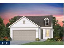 Charming one-story home with a two-car garage and a dormer window amidst lush landscaping at 717 Blue Iris Way, Summerville, SC 29486