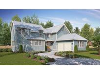 Beautiful two-story home with a metal roof, a two-car garage, and a well-manicured lawn at 931 Kincade Dr, Mount Pleasant, SC 29464
