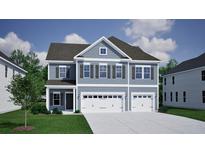 Charming new construction townhouse featuring a two-car garage, gray siding, and a well-manicured lawn at 122 Crosscut Ln, Summerville, SC 29486