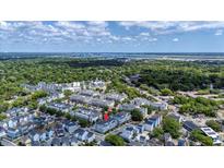 An aerial view of lovely townhomes surrounded by lush green trees and landscaping at 4404 Avery Ave, North Charleston, SC 29405